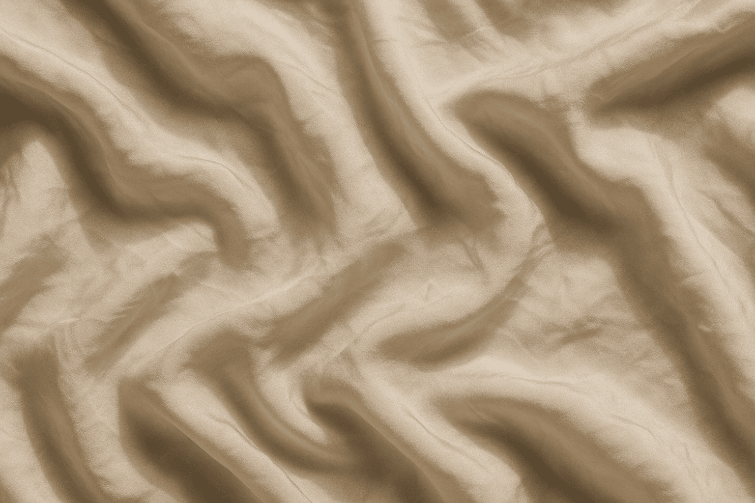 Close-up detailed view of crinkled fabric texture showing natural folds and shadows