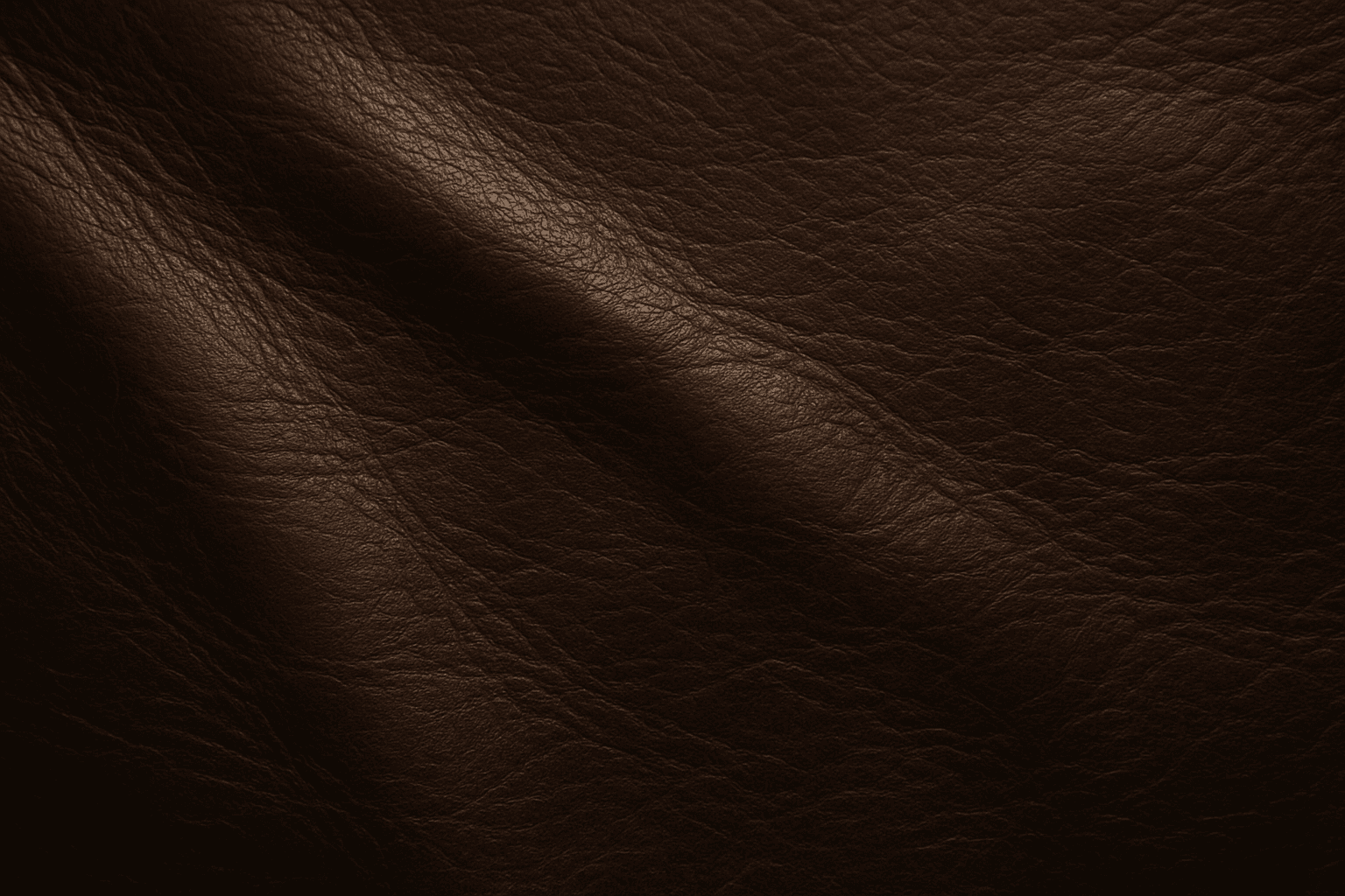 Close-up of realistic dark brown leather texture showing natural grain and subtle wrinkles
