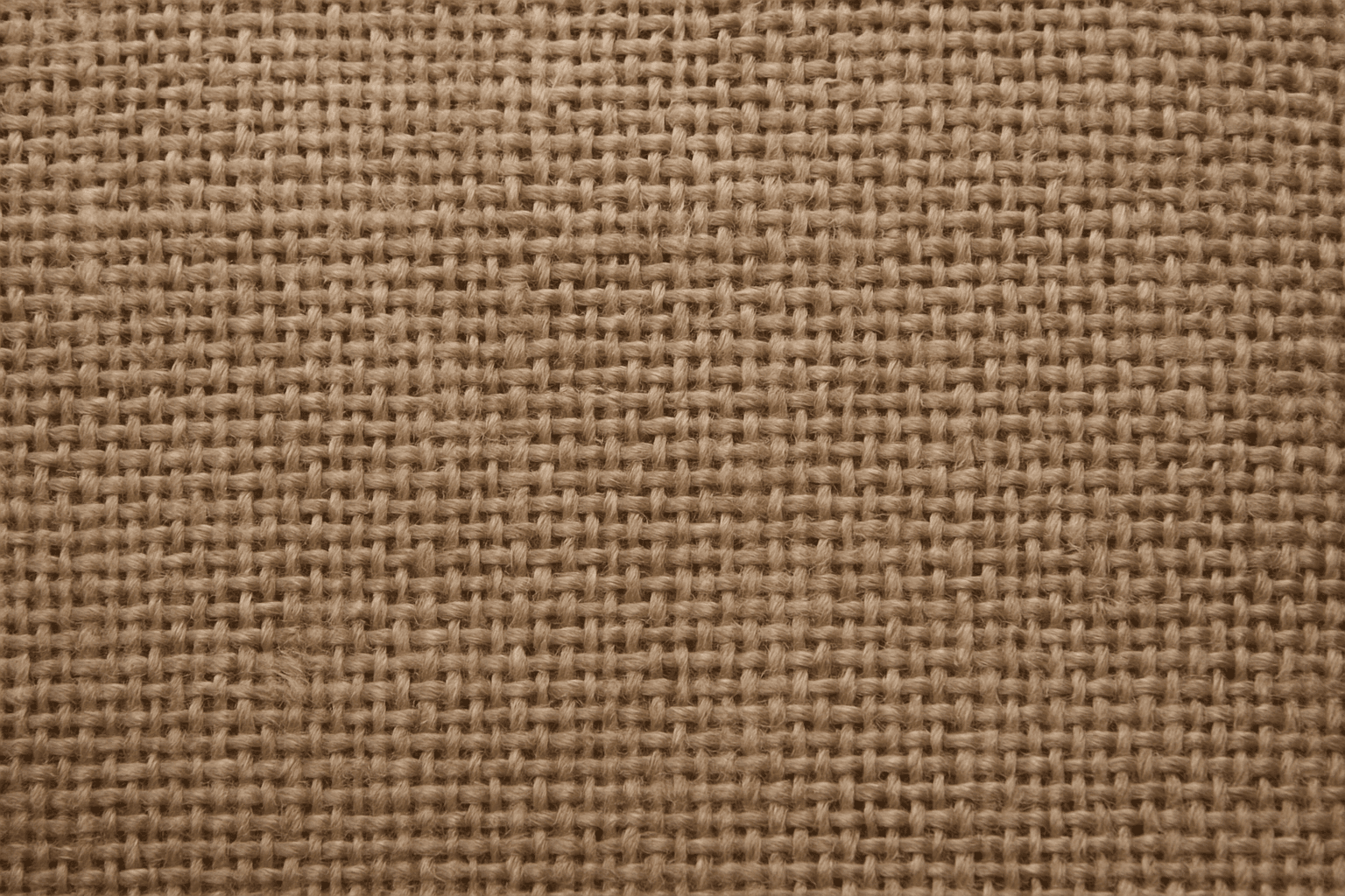 Close-up of rough canvas surface texture showing coarse weave and fibers