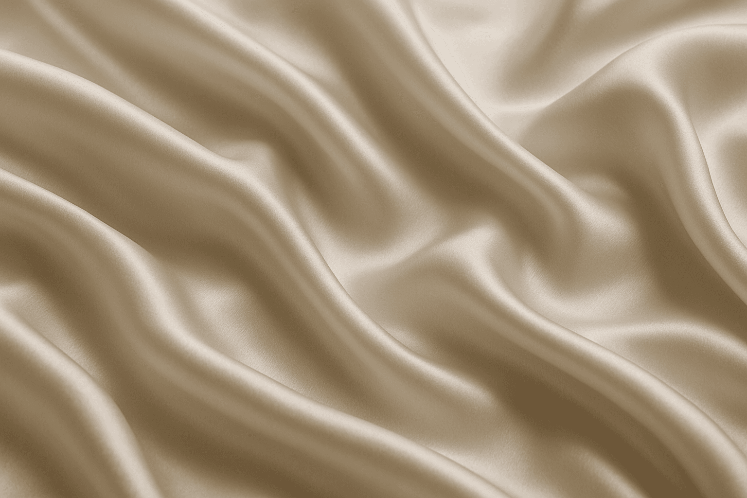 Close-up of smooth silk fabric texture showing glossy surface and elegant folds